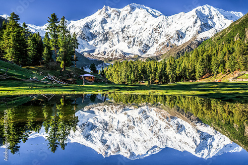 Reflection of the Nanga Parbat at 8,126 meters well know as the Killer mountain in the Himalaya ragenge  photo
