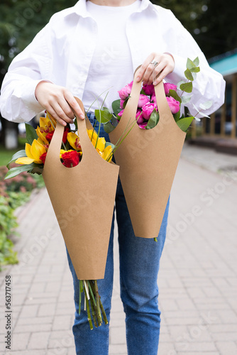 girl holding flowers in a beautiful package