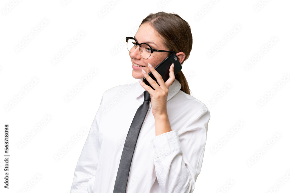 Young business caucasian woman over isolated background keeping a conversation with the mobile phone with someone Young business caucasian woman over isolated background keeping a conversation with the mobile phone with someone