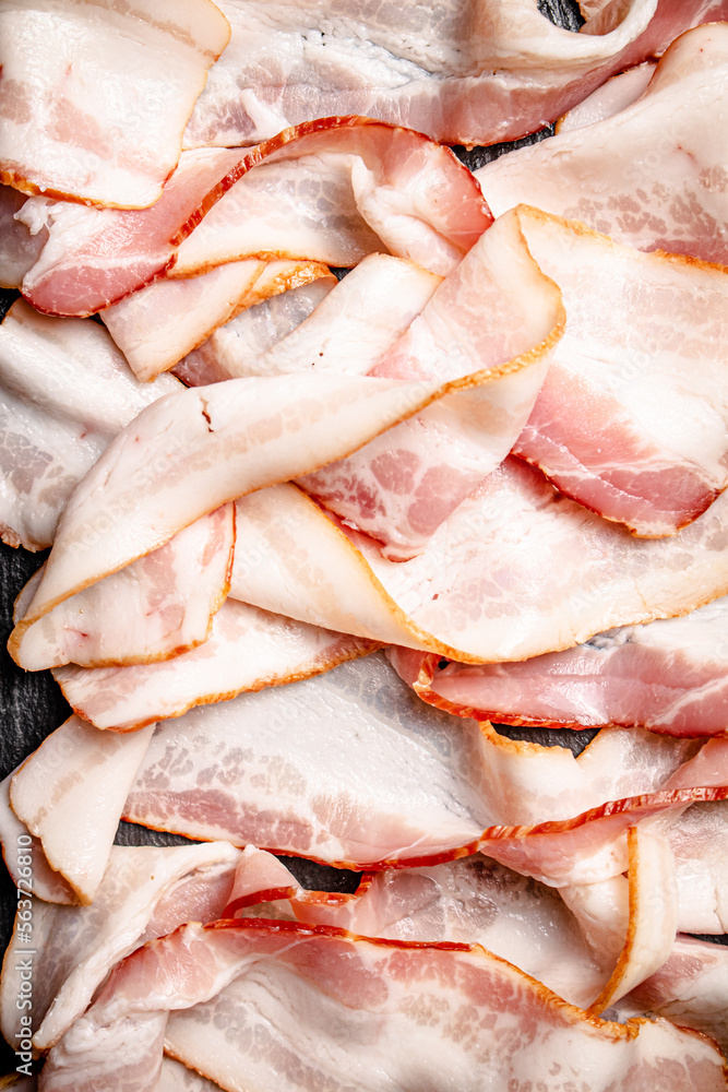Strips of bacon. Macro background.