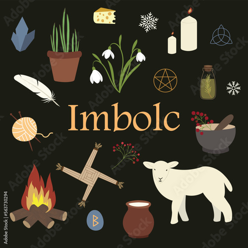 Imbolc celebration set with a lamb, milk, bottle, pounder, candles, snowdrops and cross. photo