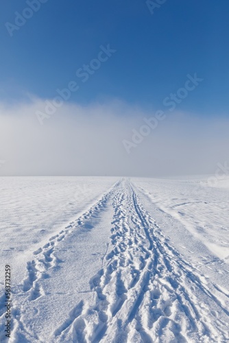 Tracks in the snow building a way © bmf-foto.de