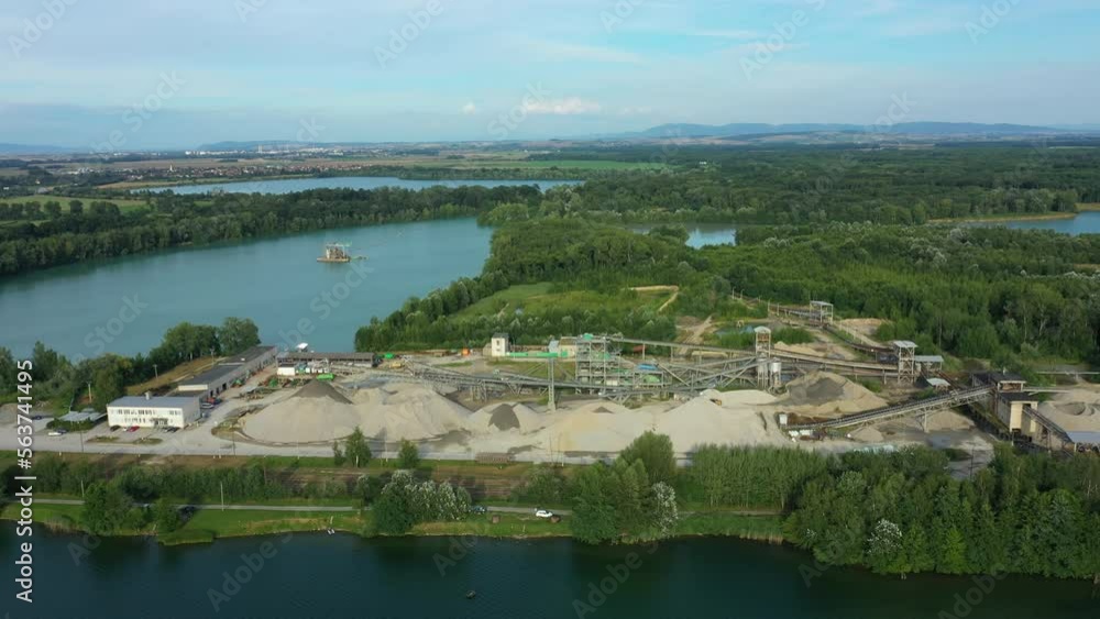 Mining sand gravel pile factory open pit drone aerial Tovacov excavator crane bucket transport by car track trailer and rail digger machine dredger extraction colliery output building surface gray Mining sand gravel pile factory open pit drone aerial Tovacov excavator crane bucket transport by car track trailer and rail digger machine dredger extraction colliery output building surface gray