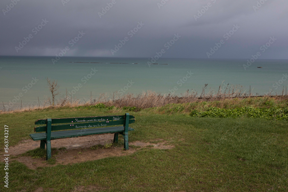 bench on top of cliff at Gold Beach, Normandy, France, Site of D-Day. 