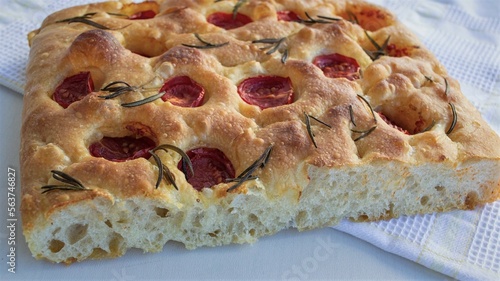 Homemade focaccia with tomatoes cherry. Home italian kitchen