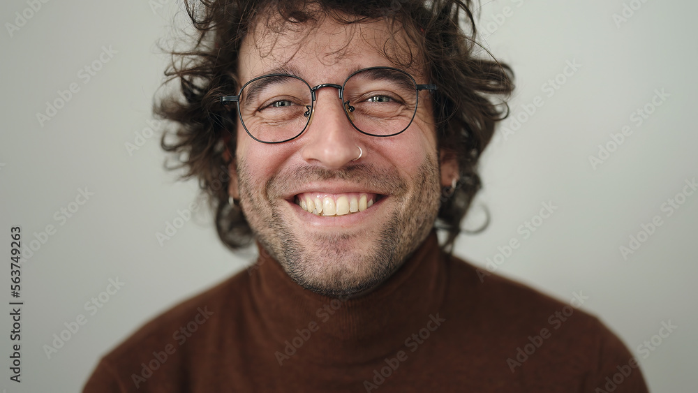 Young hispanic man smiling confident standing over isolated white background Young hispanic man smiling confident standing over isolated white background