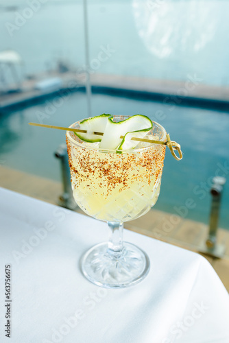 tropical cocktail with sea backgroundglass, drink, cocktail, milk, beverage, alcohol, cream, food, white, isolated, ice, cold, fruit, coffee, sweet, juice, smoothie, dessert, shake, fresh, milkshake,  photo