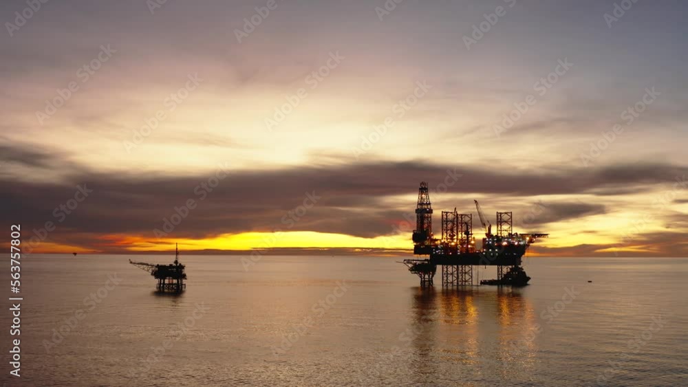 Aerial view of offshore jack up drilling rig during sunset - oil and gas industry
Aerial view of offshore jack up drilling rig during sunset - oil and gas industry
