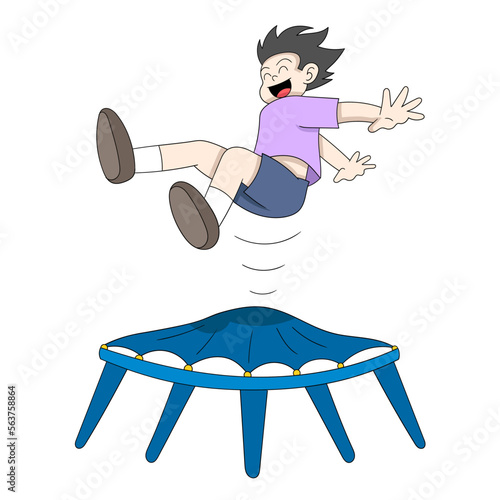 boy is jumping on the trampoline happily