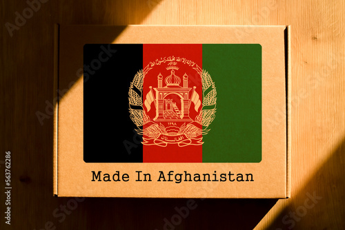 Made in Afghanistan. Cardboard boxes with text "Made In Afghanistan" and the Flag of Afghanistan.
