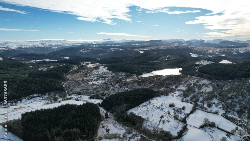 Snowdonia, Wales (UK), Winter 2023. Aerial landscapes of snow and mountains.