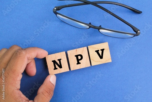 letters of the alphabet with NPV or net present value. the concept of business value photo