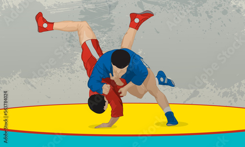 The wrestler makes a throw through the hip. Athletes in red and blue kimono. Russian national wrestling.