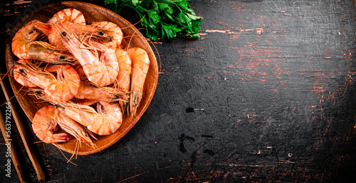 Fototapeta Naklejka Na Ścianę i Meble -  Cooked shrimp in a plate with parsley.