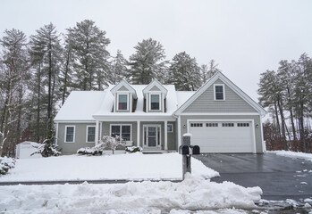 winter residential house after snow storm