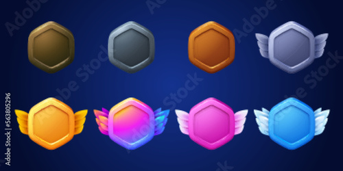 Game badges, buttons in hexagon frame with wings. Game medals, metal, golden, bronze, silver and gradient colored emblems, vector cartoon set isolated on background