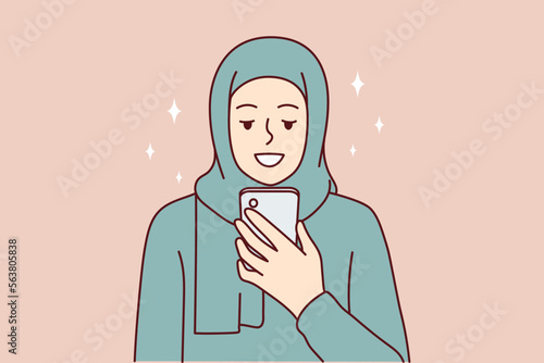 Muslim woman smiling using mobile phone for text messaging or visiting islamic sites. Girl with hair covered with niqab or paranja rejoices after receiving email in smartphone. Flat vector design 