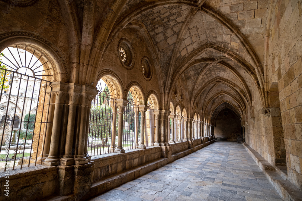 Corridor of the cloister of the monastery of the Santa Tecla Cathedral in Tarragona, Catalonia, Spain