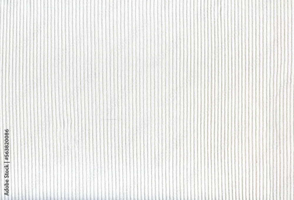 Obraz premium Beautiful white background with a vertical texture of fabric or knitwear