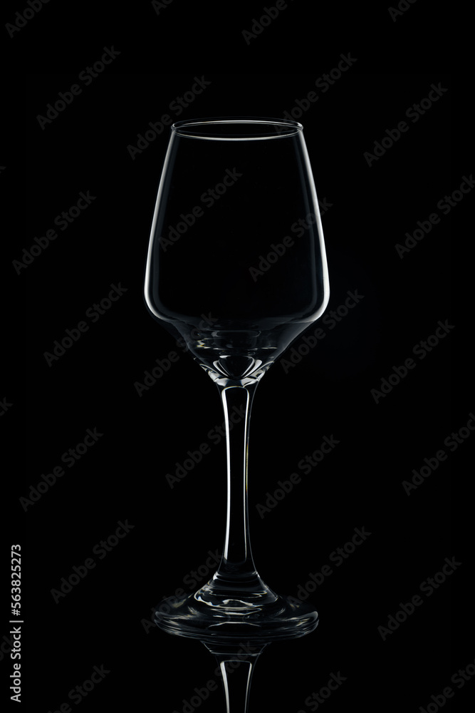 Empty tall wine glasses on black background, isolated Empty tall wine glasses on black background, isolated