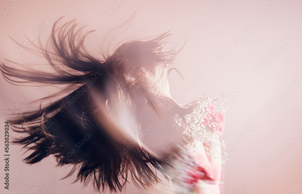 Fototapeta premium Young woman with bouquet of flowers. Double exposure effect.