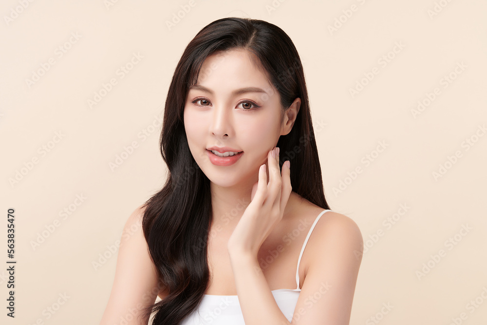 Beautiful young asian woman with clean fresh skin on beige background, Face care, Facial treatment, Cosmetology, beauty and spa, Asian women portrait. Beautiful young asian woman with clean fresh skin on beige background, Face care, Facial treatment, Cosmetology, beauty and spa, Asian women portrait.
