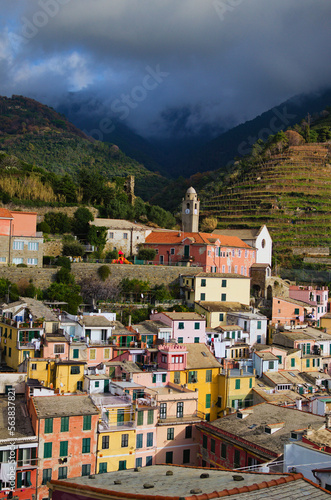 Aerial landscape of Vernazza village. Ancient buildings between mountains and the sea. Famous touristic place and travel destination in Italy. Vernazza, Cinque Terre. UNESCO World Heritage Site