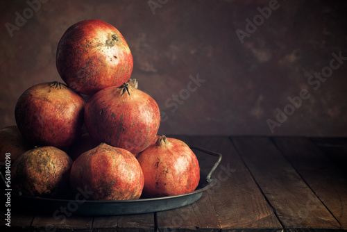 Pomegranates on a metal tray