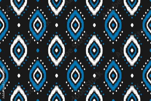 Ethnic ikat seamless pattern in tribal. American, Mexican style. Aztec geometric ornament print. Design for background, wallpaper, illustration, fabric, clothing, carpet, textile, batik, embroidery.