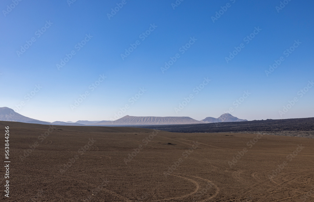 Views across the black lava volcano field of Jabal Qidr in the Harrat Khaybar region, north west Saudi Arabia Views across the black lava volcano field of Jabal Qidr in the Harrat Khaybar region, north west Saudi Arabia