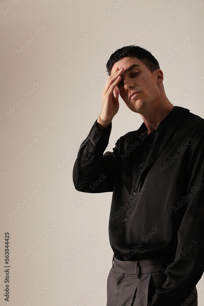 Young man with serious expression and ideas, looking at the camera. Mindset.