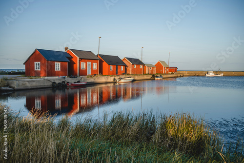 Sweden, Oland, Grasgard, Small harbor of secluded fishing village photo