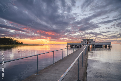 Sweden, Oland, Borgholm, Coastal bathhouse at dusk photo