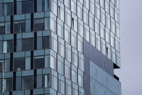 Modern business center construction place for corporations headquarters with cloudy sky reception. New buildings construction industry.