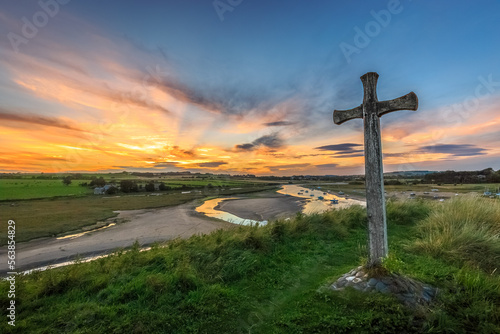 Sunsetting in the Northumberland hills with St Cuthbert's cross in Foreground  photo