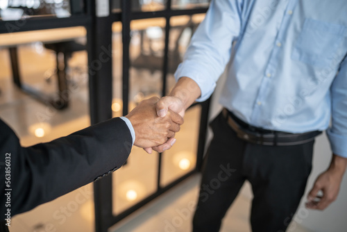 Lawyer Legal counsel Businessman shaking hands successful making a deal. mans handshake. Business partnership meeting concept.