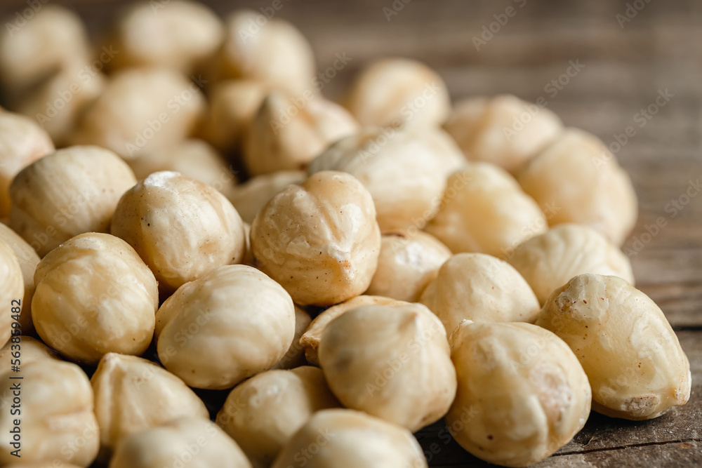Heap of roasted hazelnuts close-up, macro shot. Heap of roasted hazelnuts close-up, macro shot.