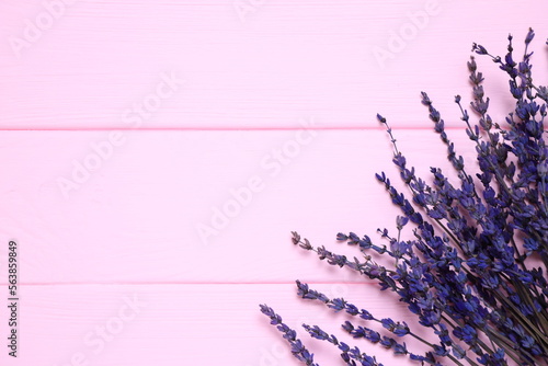 Lavender flowers on wooden background