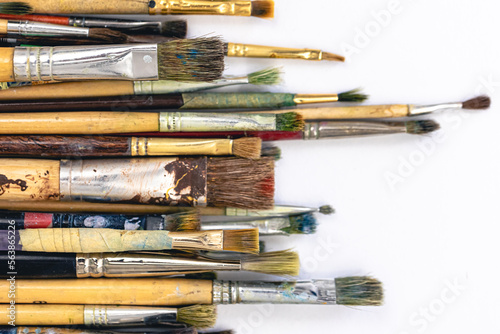 Close-up, brushes for drawing on a white background.