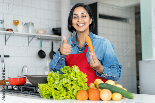 Hispanic woman preparing vegetarian or vegan food