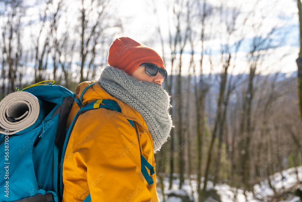 Photographer taking a photo in winter on the mountain with snow, winter hobbies Photographer taking a photo in winter on the mountain with snow, winter hobbies