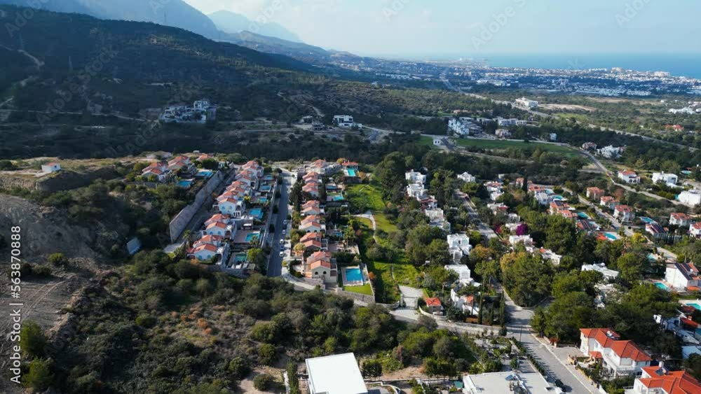 Northern Cyprus. Drone view. The mountains, sunlight and the blue ocean from a bird's eye view. Heaven on Earth. The horizon with the mountains in the sunlight. boats are standing on the shore. Northern Cyprus. Drone view. The mountains, sunlight and the blue ocean from a bird's eye view. Heaven on Earth. The horizon with the mountains in the sunlight. boats are standing on the shore.