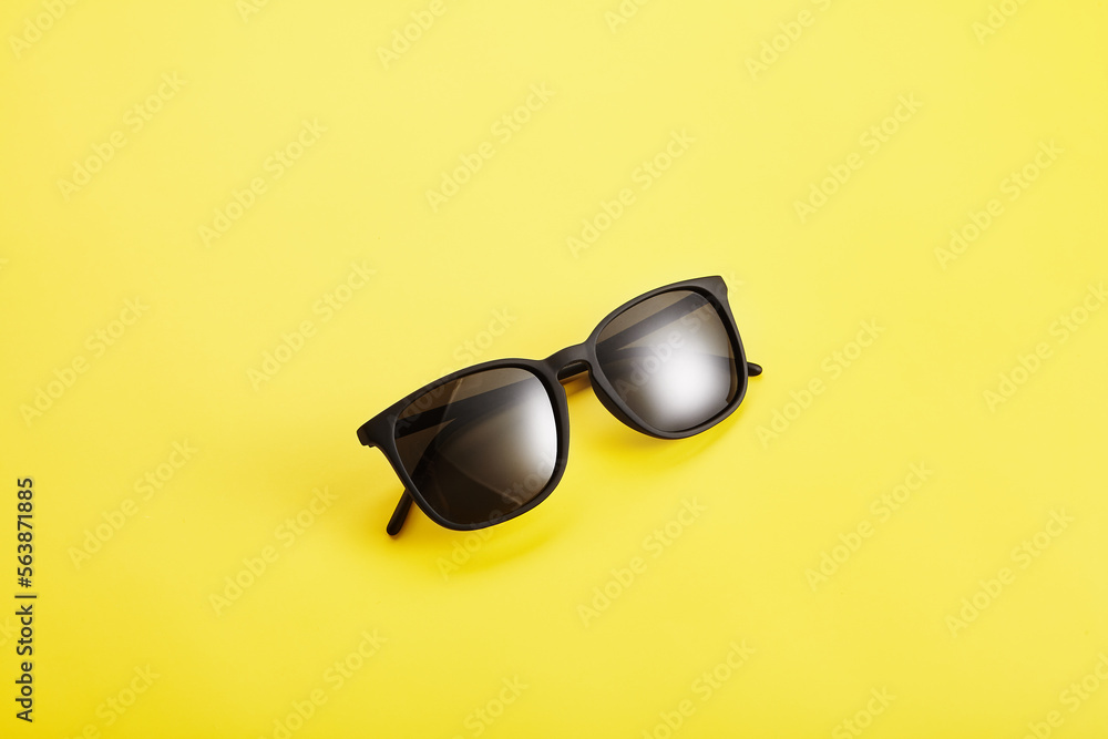 Sunglasses with black lenses, plastic spectacle frame. Sunglasses with black lenses, plastic spectacle frame.