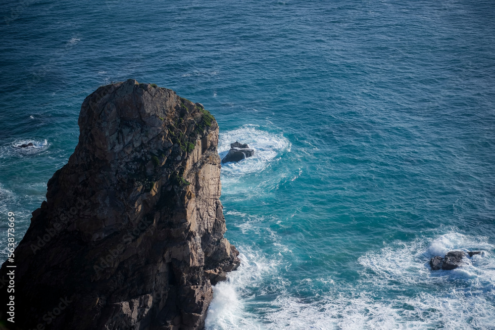 View of a rocky cliff on the Atlantic coast of Portugal.  .