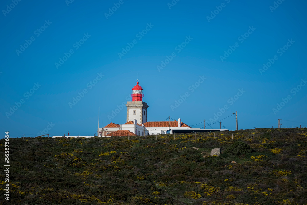 Lighthouse building at Cape Roca on the Atlantic coast of Portugal.  .