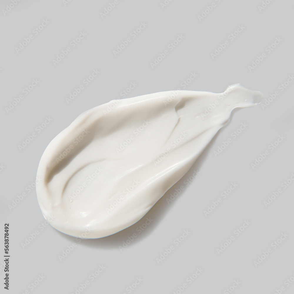 cosmetic cream on a grey background