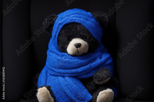 photo of a teddy bear wearing a blue scarf, blue Monday - Generative AI © Fernando