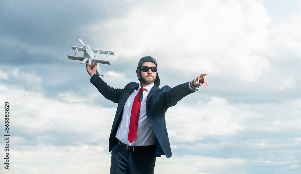businessperson in suit and pilot hat launch plane toy on sky background businessperson in suit and pilot hat launch plane toy on sky background