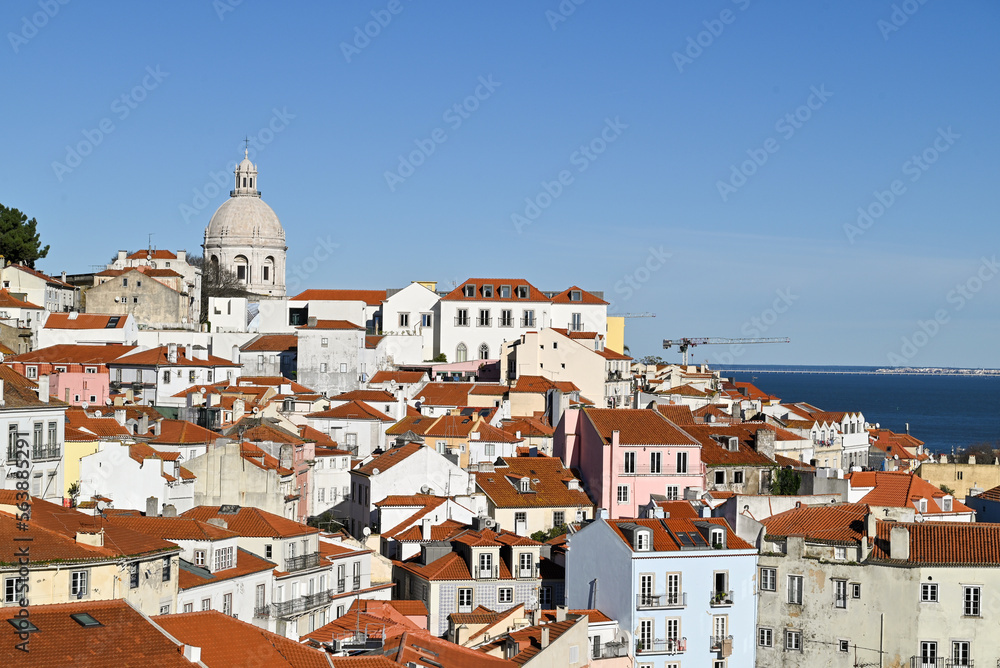 Beautiful colorful and vibrant  cityscape of Lisbon, Portugal.
Church of Sao Vicente of Fora (Igreja de Sao Vicente de Fora) and old buildings in Alfama and Graca districts in Lisbon, Portugal.