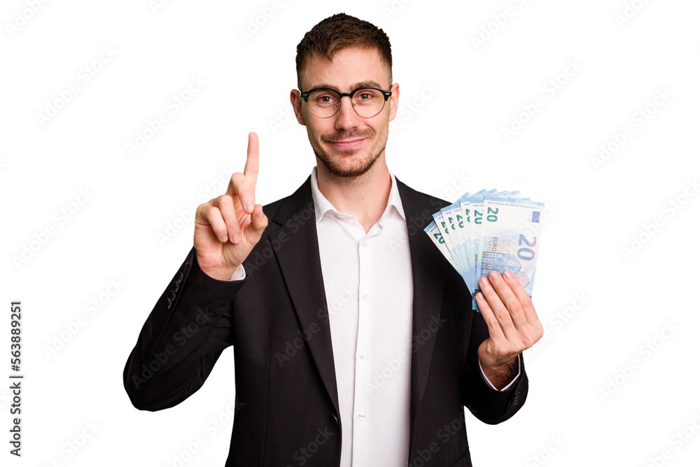 Young business caucasian man holding euro banknotes isolated cut out showing number one with finger. Young business caucasian man holding euro banknotes isolated cut out showing number one with finger.